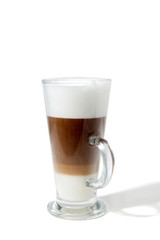 a glass of latte macchiato coffee