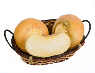 yellow turnips in wicker basket