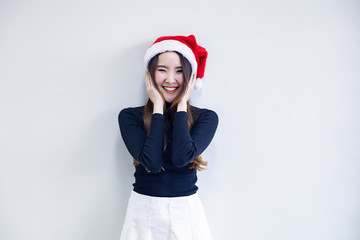 Young woman in costume Christmas on white background.