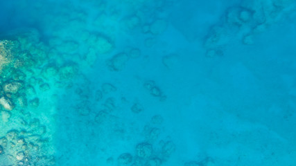 Fototapeta na wymiar Aerial landscape seascape of coral reef and turquoise sea water, top view. Sea surface. Ecology concept, sea nature