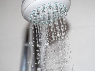 Obraz na płótnie Canvas drops of water from shower head