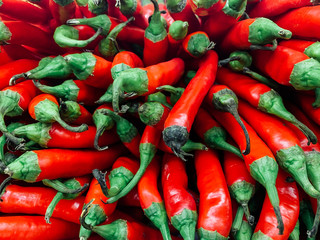 lots of red hot peppers for eating like a background