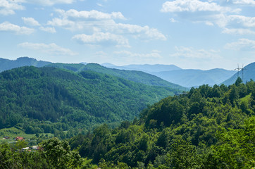 Lush idyllic landscape with hills and valleys in summer - Serbia