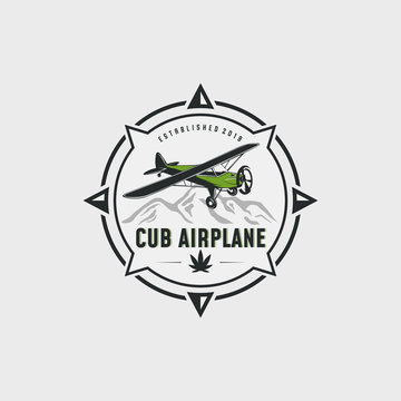 Cub airplane with compass logo design illustration. Cub ariplane vector