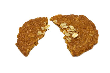 Biscuits homemade Oatmeal flavoured and Thin style. Broken of crunchy delicious sweet meal and useful cookies. Isolated on white background.