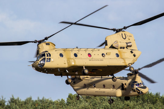 EINDHOVEN, THE NETHERLANDS - JUN 22, 2018: United States Army Boeing CH-47F Chinook transport helicopters taking off.