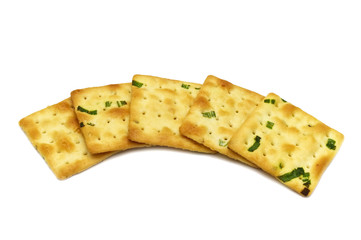 Biscuits cracker square design.Great flavor combination of green onion and wheat. Isolated on white background.