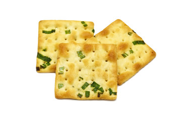 Biscuits cracker square design.Great flavor combination of green onion and wheat. Isolated on white...