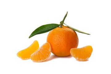 Tangerines with green branch and peeled mandarin slices, isolated