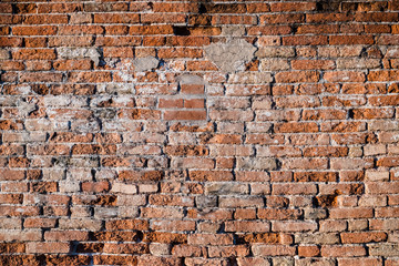 Red old brick wall texture loft grunge background. Italian masonry