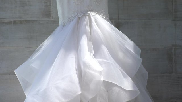 Wedding Dress at a resort Destination Wedding Hanging in the Sun