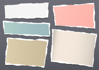 Obraz premium Set of torn white and colorful note, notebook paper pieces stuck on black background. Vector illustration