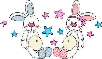 Two cute baby boy and girl bunnies with stars