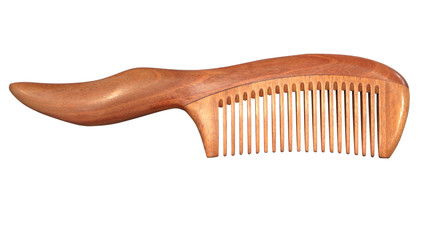 Sandalwood comb. Comb of sandalwood. Isolated image.
