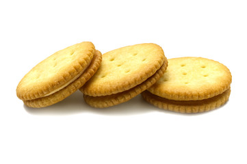 Biscuit sandwich cracker Cheese flavoured ,Cream and butter. Stack of crunchy delicious sweet meal and useful cookies. Isolated on white background.