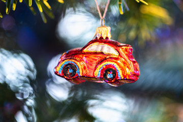 Christmas decoration o tree. Red car bauble.