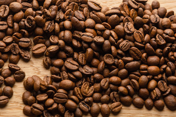 Coffee beans on a wooden table