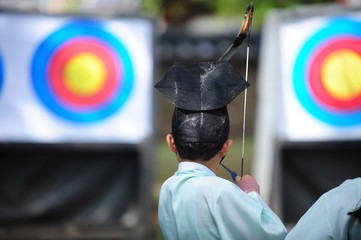 Korean children archery shot wearing in Korean traditional clothes