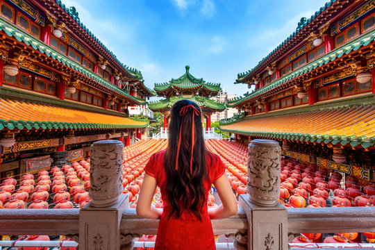 Asian woman in chinese dress traditional at Sanfeng Temple in Kaohsiung, Taiwan.