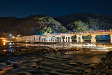 the illuminated bridge Togetsu-kyo in Arashiyama Kyoto Japan