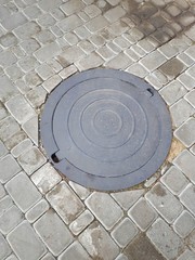 close-up of a manhole in the street