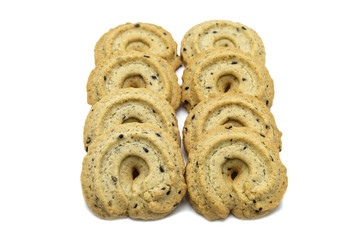 Biscuit with black sesame and honey flavored. A stack of crunchy delicious sweet meal and useful cookies. Isolated on white background.