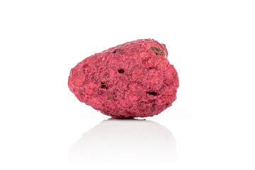 One whole dried raspberry isolated on white background