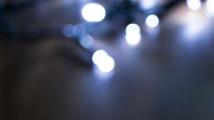 Abstract light, bokeh effect, new year lights. Dark background, bokeh light.