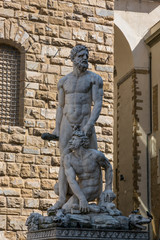 Fototapeta na wymiar Sculpture of Hercules defeating Cacus in Signoria Square in front of the Neptune Fountain in Florence