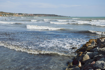 Fototapeta na wymiar Seascape with waves and stones