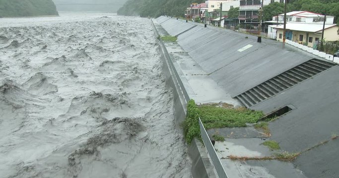 Raging River Flood Waters After Hurricane Drops Heavy Rain - Fung