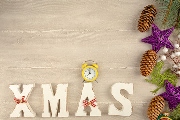 Christmas background with Christmas decorations, pine cones and spruce branch