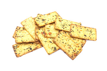 Thin biscuit with veggies flavored isolated on white background.