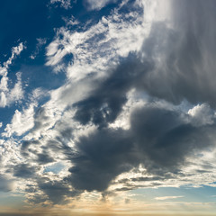 Obraz premium Fantastic clouds against blue sky, square