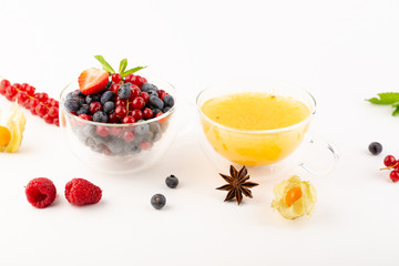 Healthy winter tea background, food on white