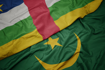waving colorful flag of mauritania and national flag of central african republic.