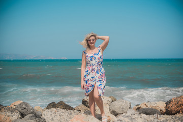 Pretty plus size nice young woman rest at sea, vacation and trip concept