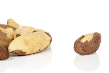Lot of whole brazil brown nut isolated on white background