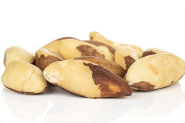 Lot of whole brazil brown nut isolated on white background