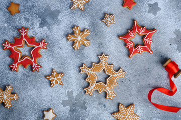 Christmas gingerbread stars and snowflakes. Background of gingerbread cookies. Top view