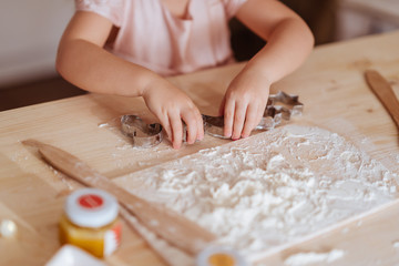 little girl cooking Christmas biscuits christmas concept