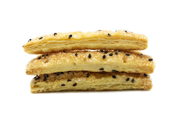 Pie or Bread stick with black sesame isolated on white background.
