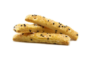 Pie or Bread stick with black sesame isolated on white background.