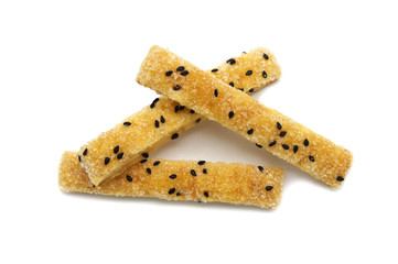 Pie or Bread stick with black sesame isolated on white background.