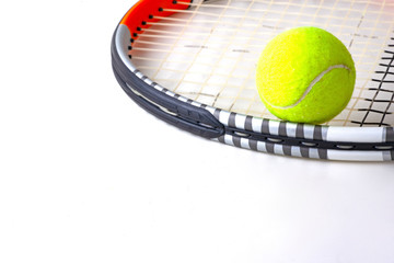 tennis ball and racket on white background