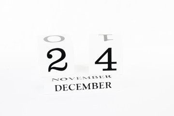 Fototapeta premium Calendar blocks against white background Christmas Eve December 24 2020