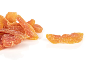 Lot of whole dried orange papaya piece isolated on white background