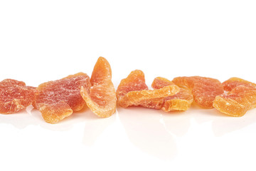 Lot of whole dried orange papaya piece isolated on white background