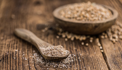 Some fresh Wheat Bran (selective focus; close-up shot)