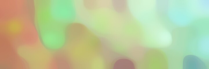 blurred iridescent horizontal background with tan, powder blue and rosy brown colors and space for text or image